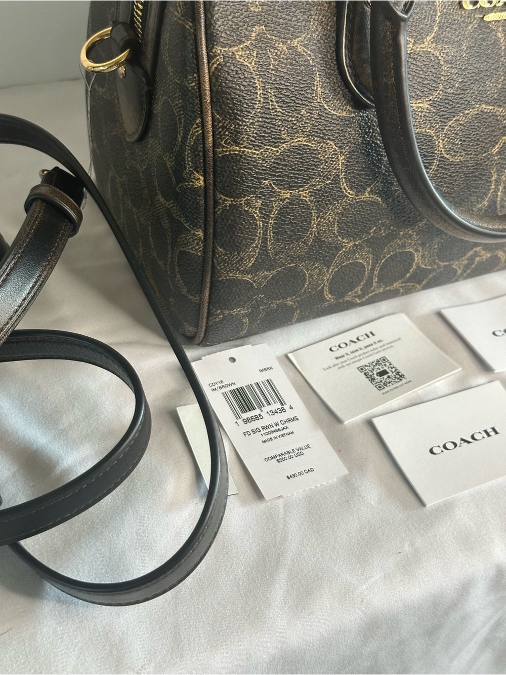 Coach Rowan Satchel Bag
In Loved Signature Canvas With Charms Brown and Gold - Picture 9 of 12